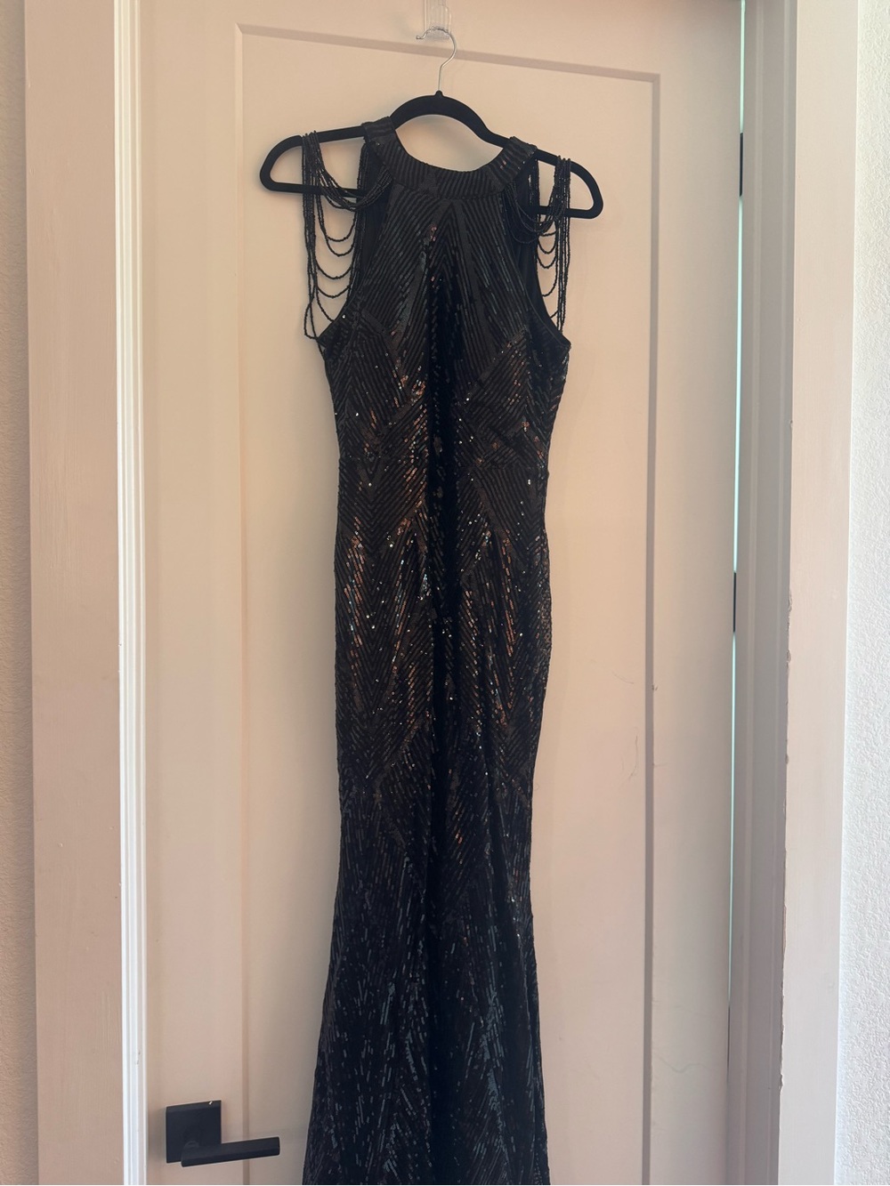 Black Beaded Evening Gown with Decorative Shoulder Chains